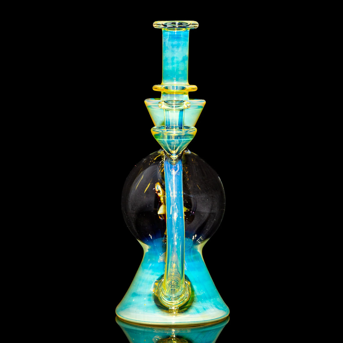 Heady glass water pipe with intricate blue and yellow design on black background