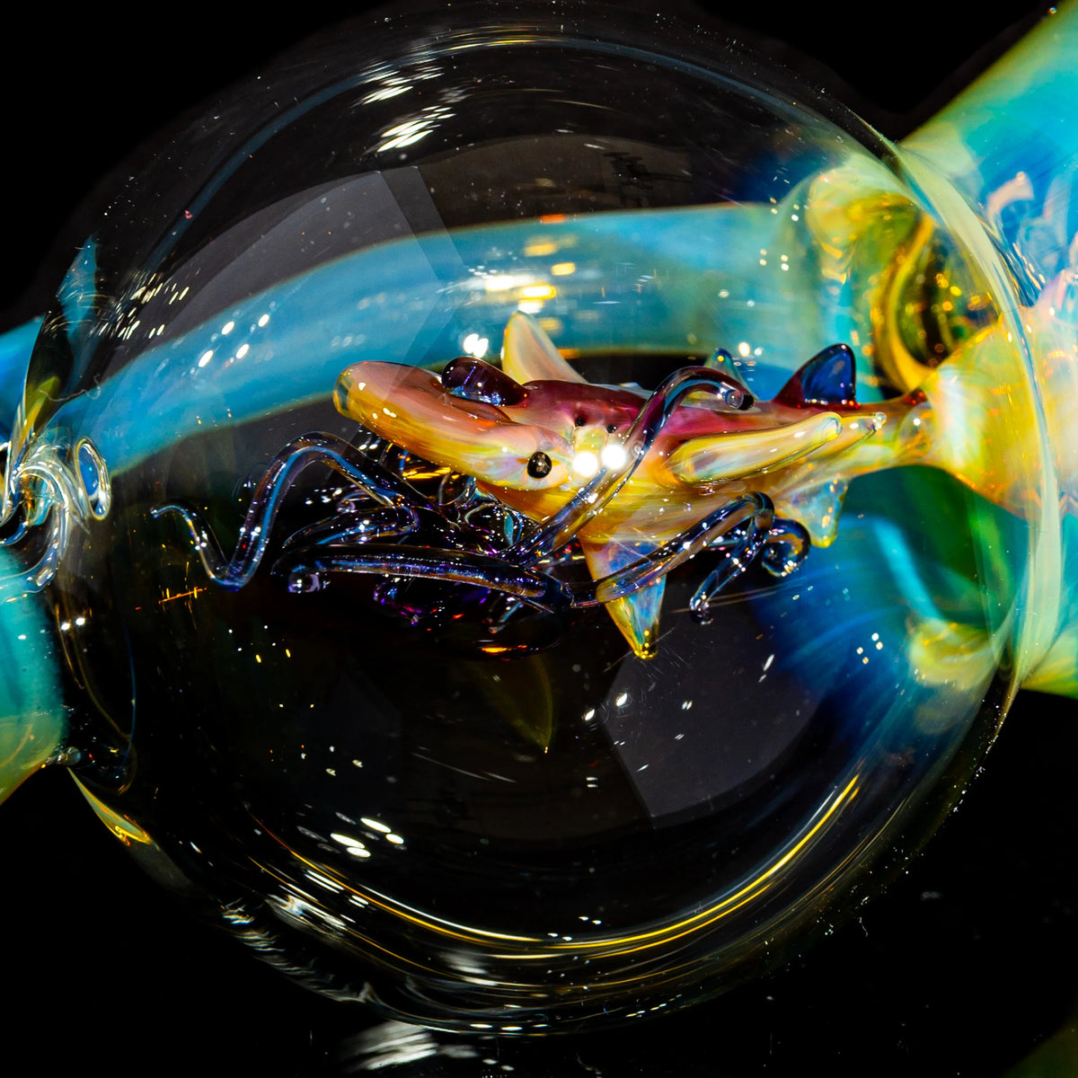 Hand-blown heady glass pipe featuring a detailed shark and underwater theme, vibrant colors