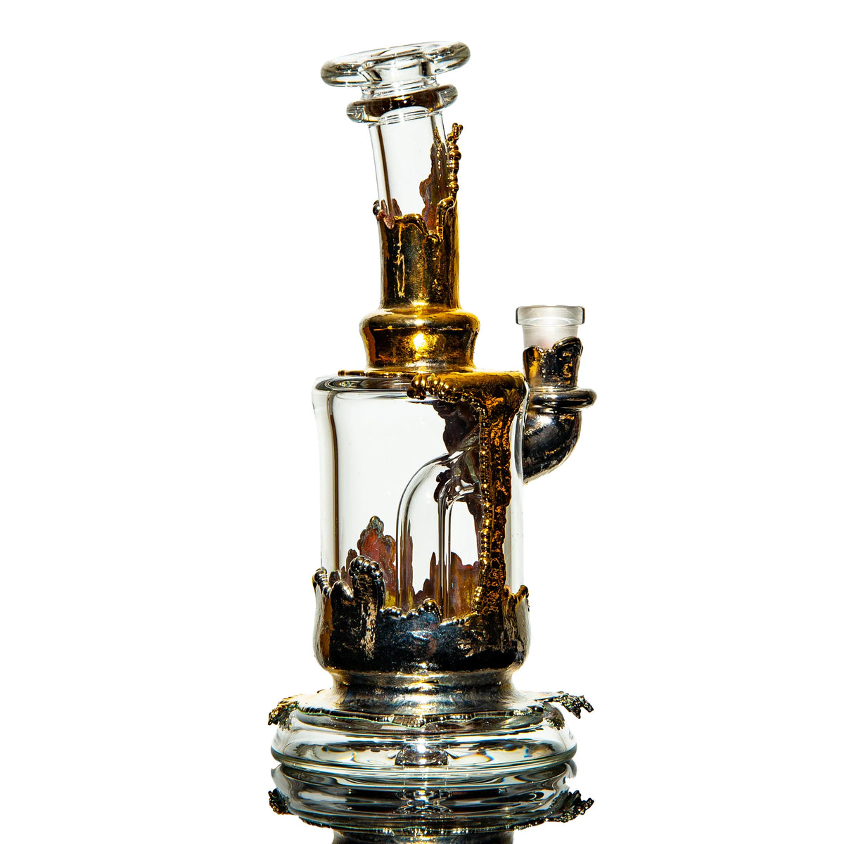 Heady glass water pipe with gold decorative accents and intricate design on white background