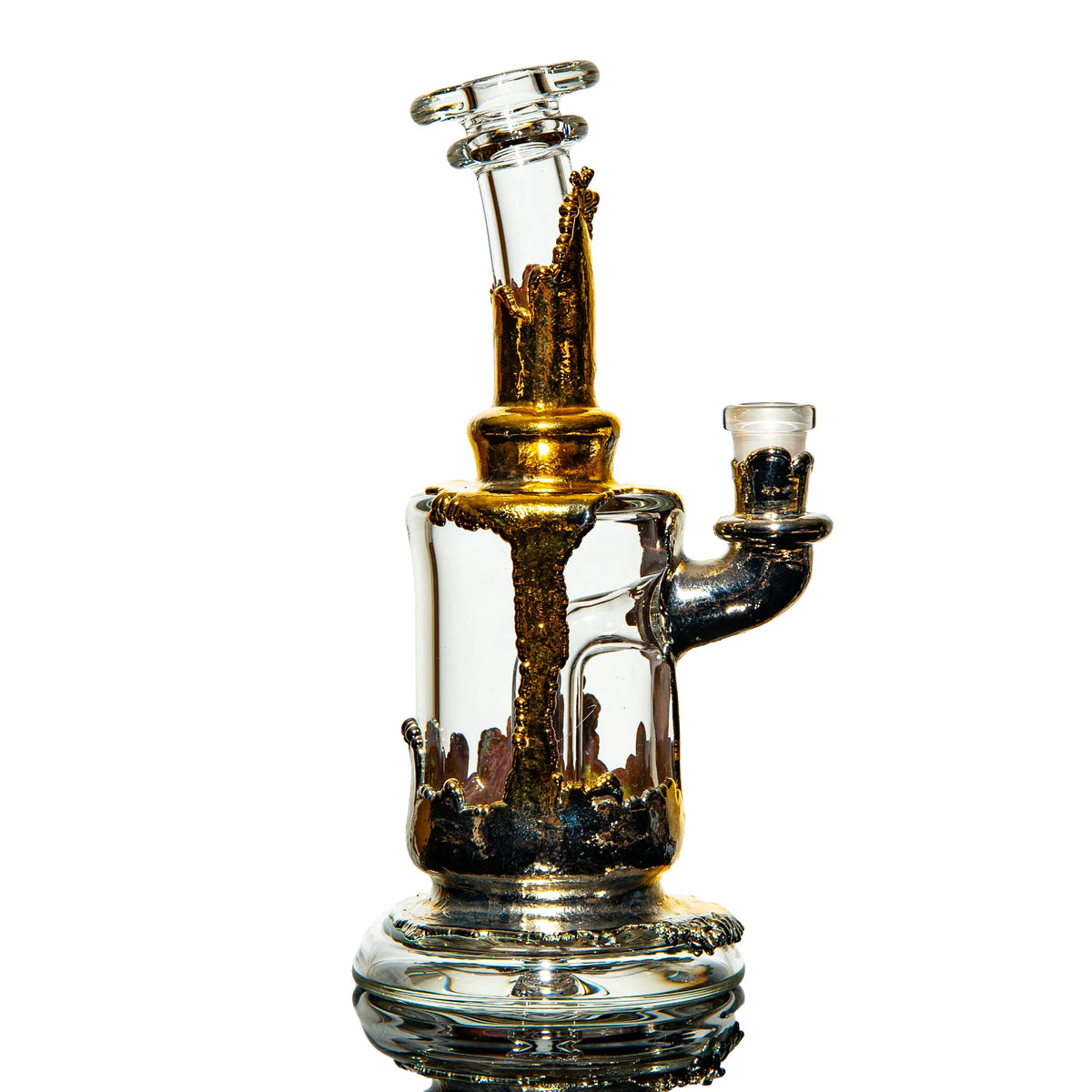 Heady glass water pipe with gold accents on a white background