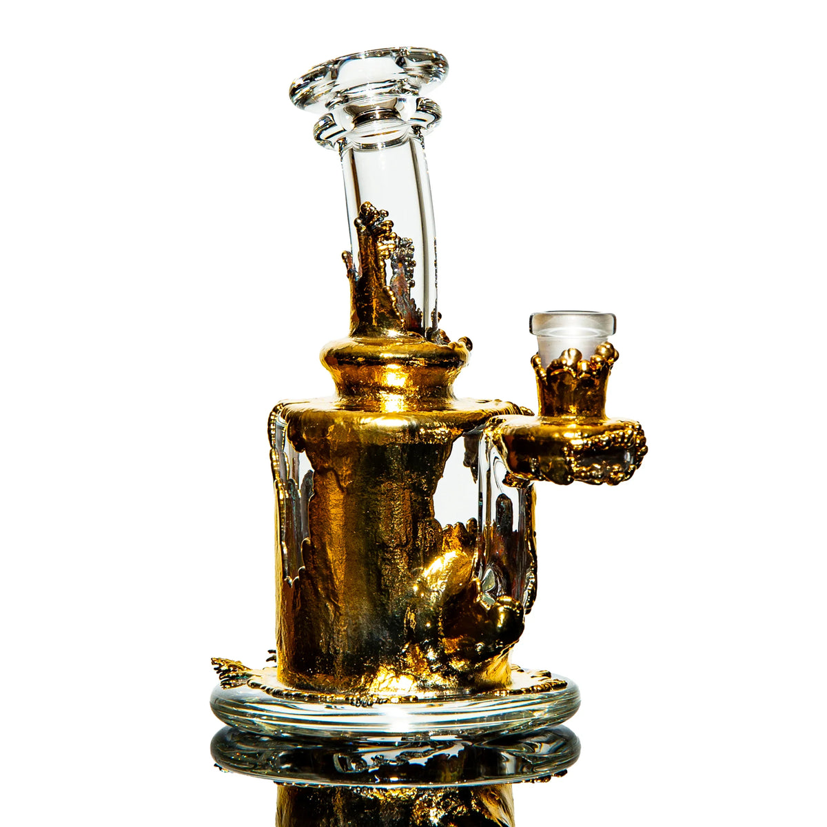 Clear glass water pipe with gold accents and intricate detailing, isolated on white background.