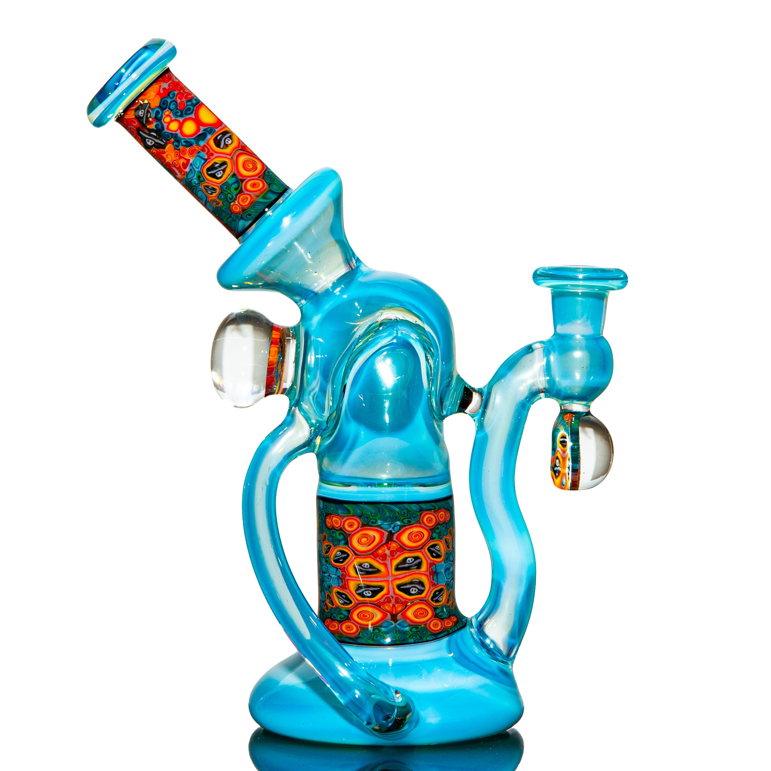 Blue glass water pipe with intricate red and orange patterns, displayed on a white background.