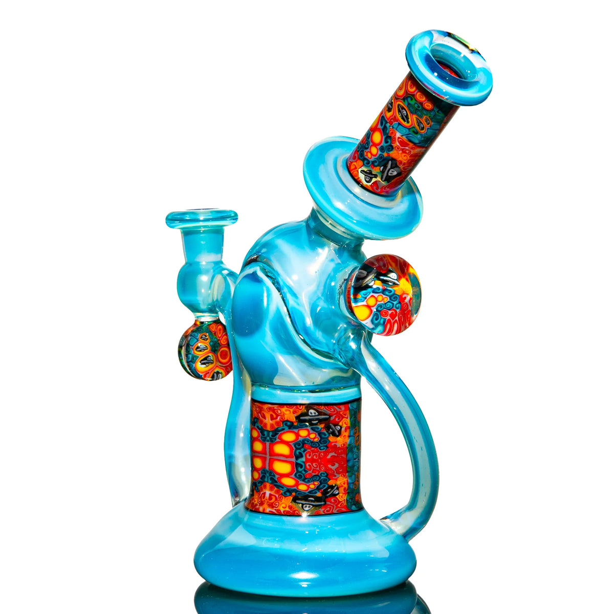 Blue heady glass water pipe with vibrant red and yellow psychedelic patterns