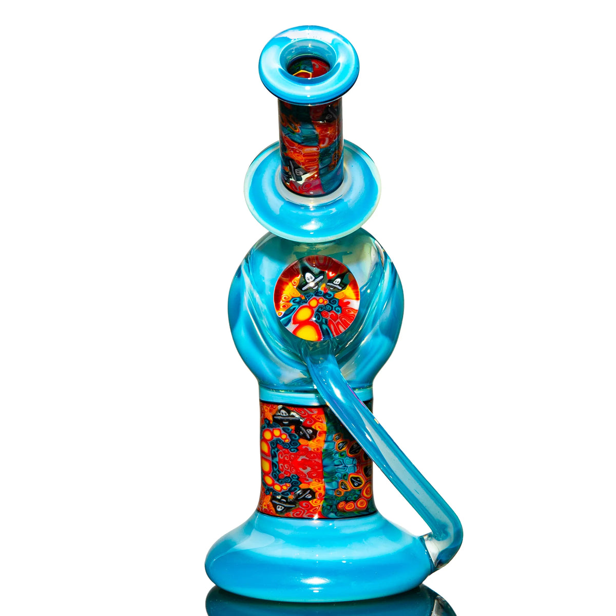 Colorful blue and red heady glass water pipe with intricate patterns on white background