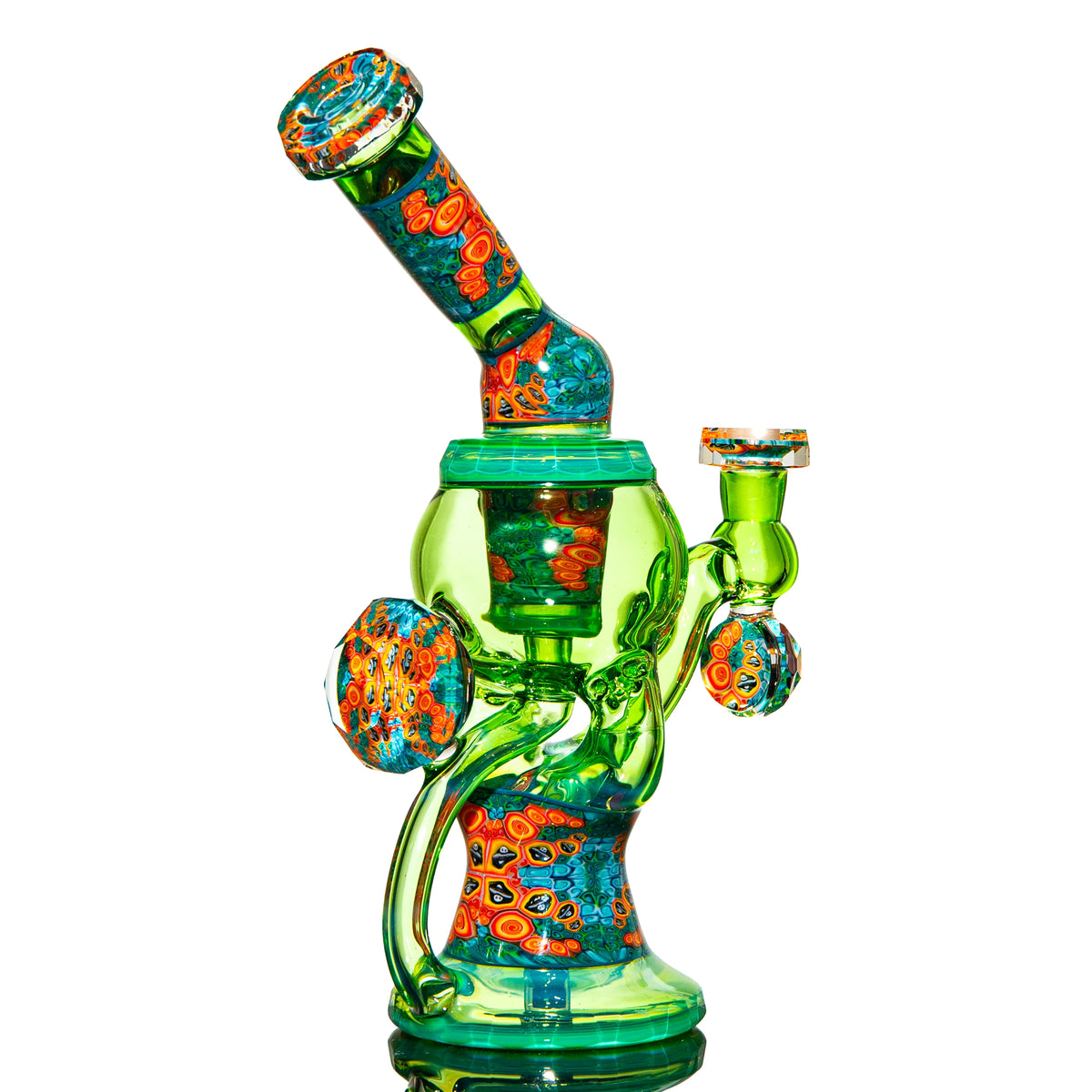 Heady glass water pipe with vibrant green and multicolored marbled accents on white background