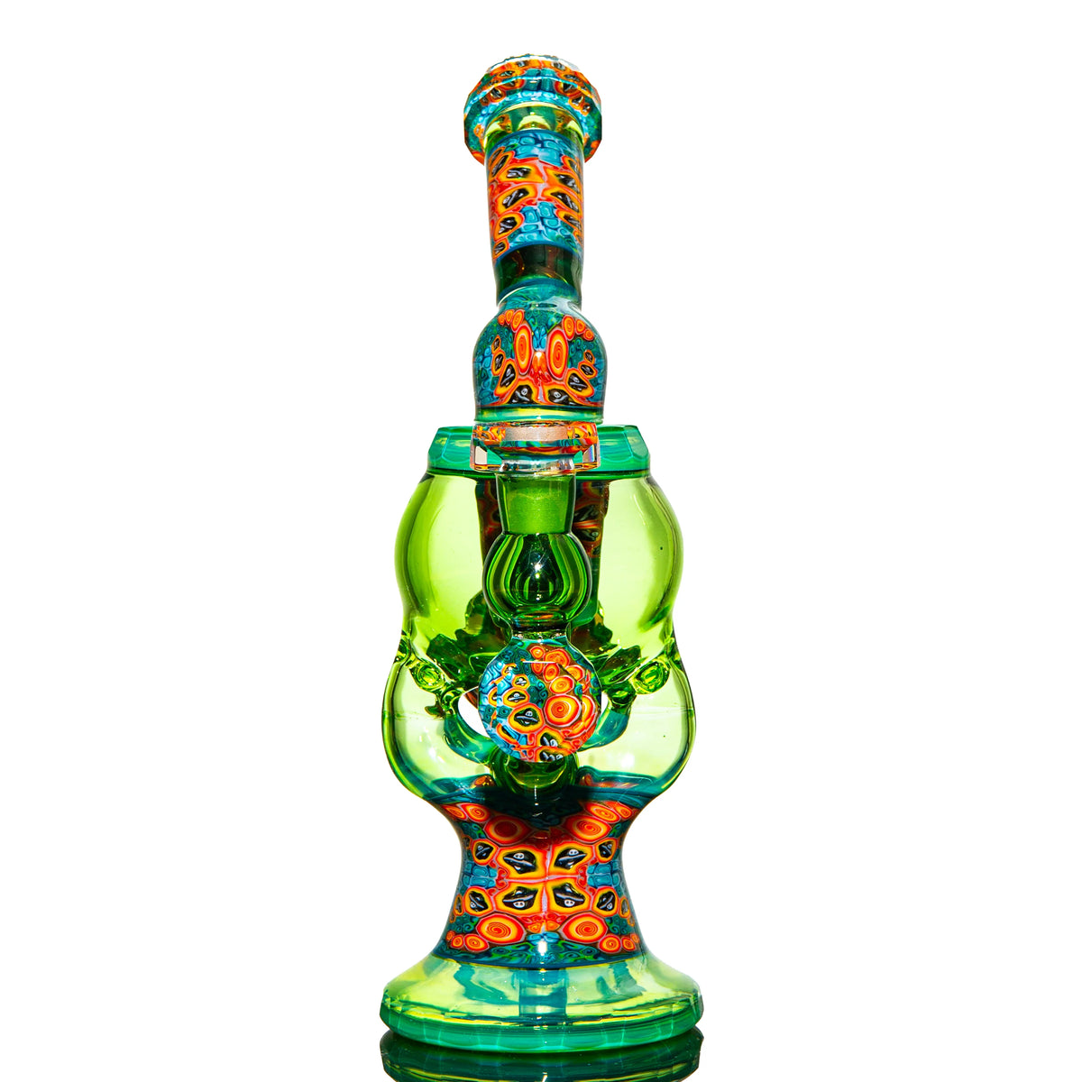 Colorful heady glass water pipe with green body and intricate orange, blue patterns