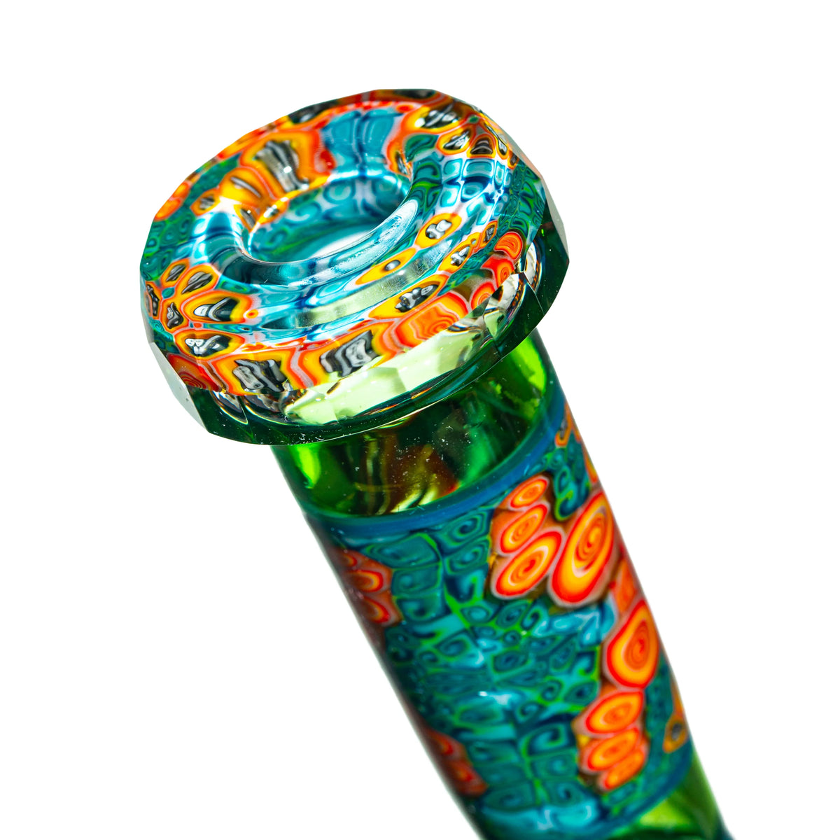 Close-up of colorful hand-blown glass tube with intricate swirling patterns