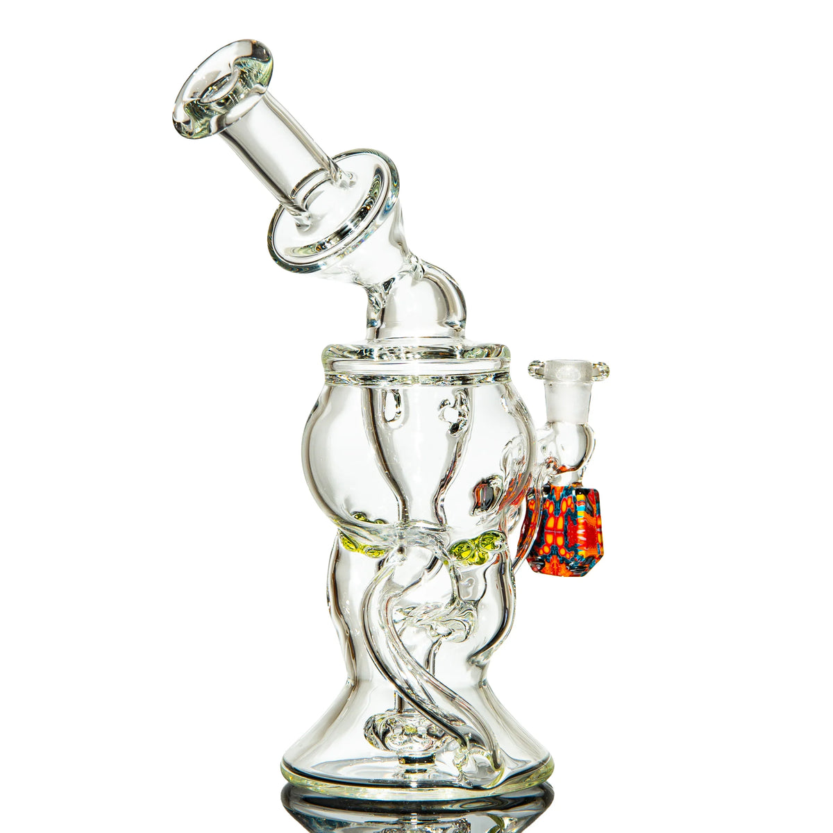 Clear glass water pipe with colorful accent, intricate recycler design on white background