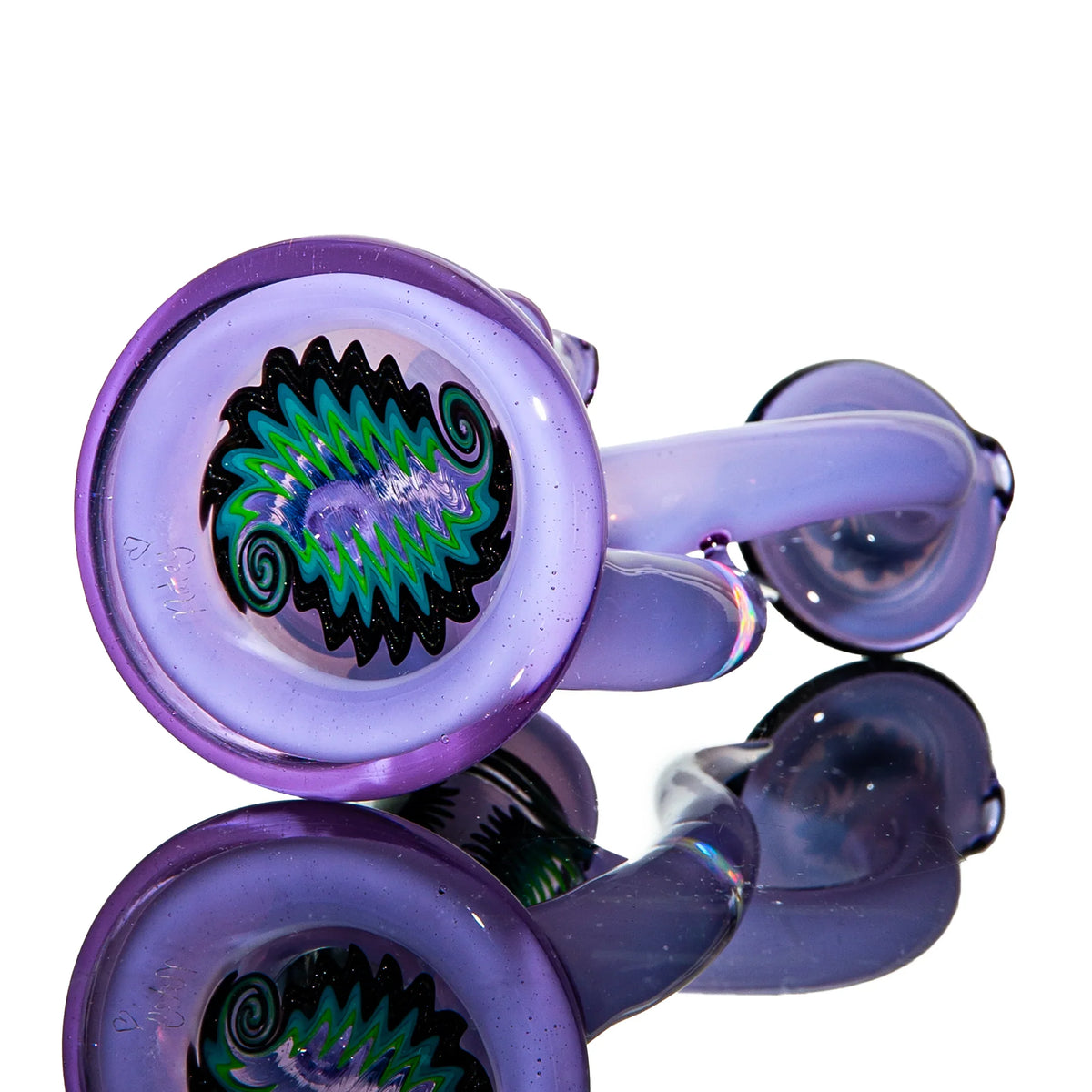 Purple heady glass hand pipe with colorful spiral design, reflected on a glossy surface
