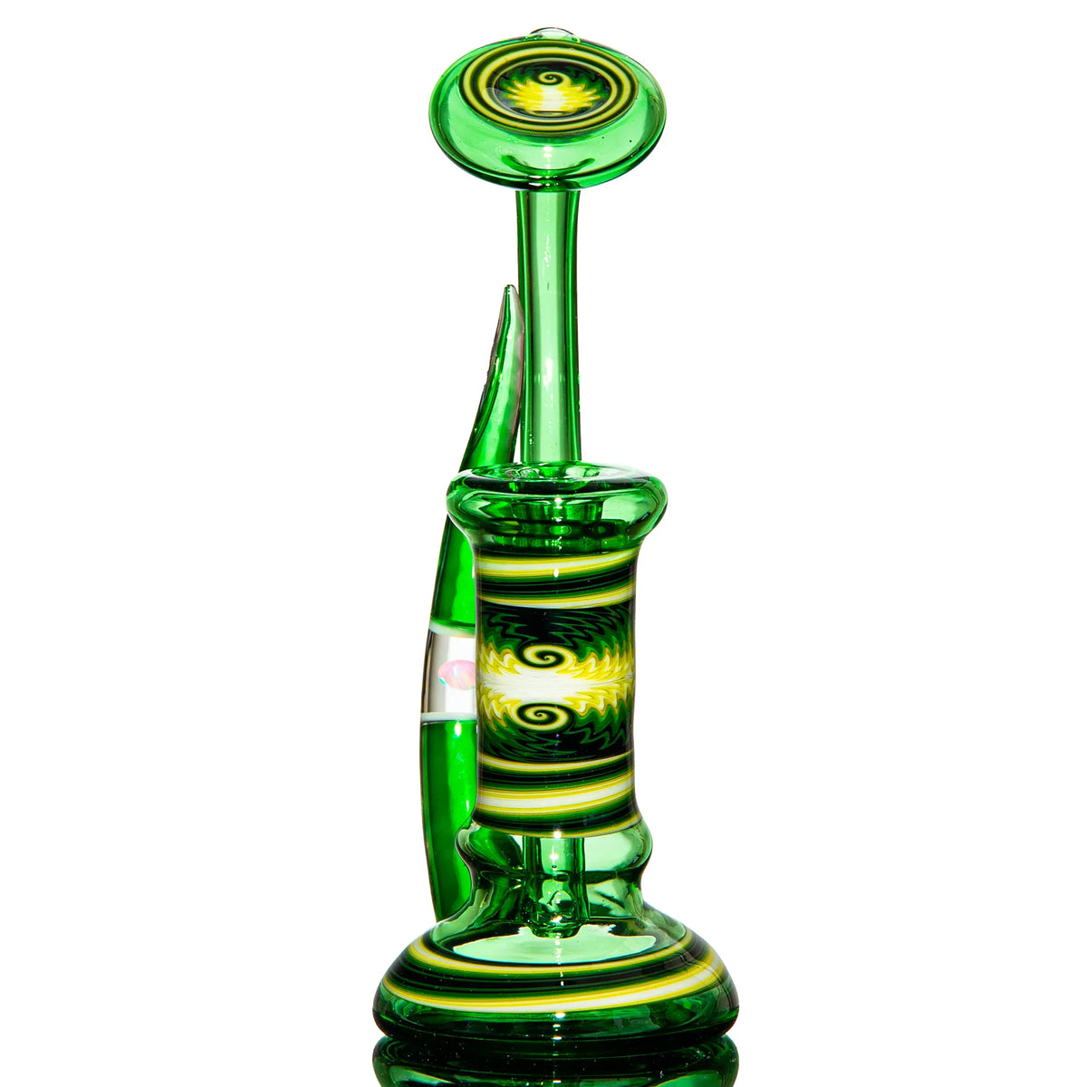 Green heady glass water pipe with intricate yellow and black spiral designs on white background