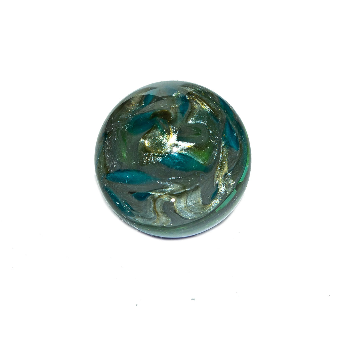 Handcrafted glass marble with blue and green swirls on a white background