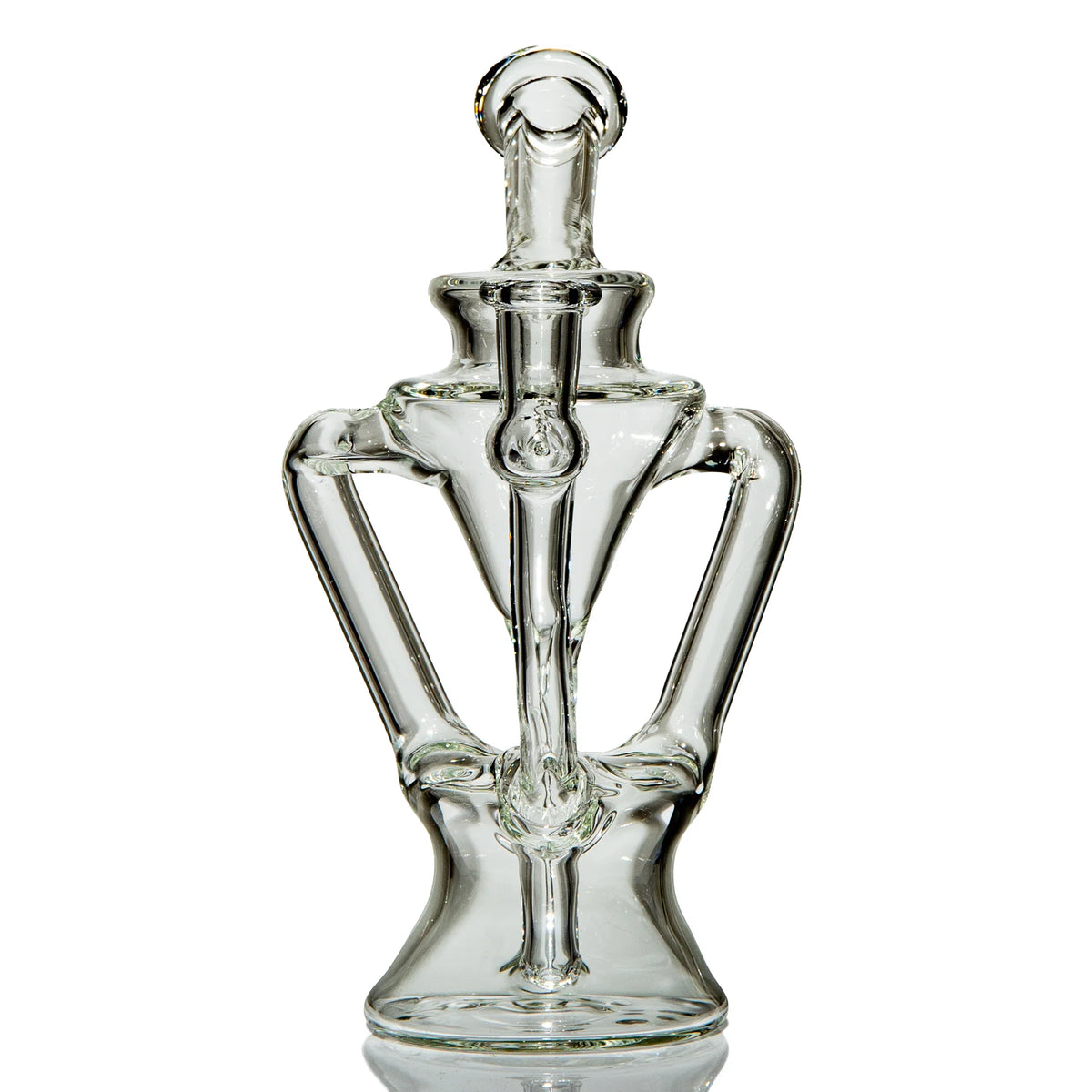 Clear intricately blown glass water pipe with sculptural arms on white background.