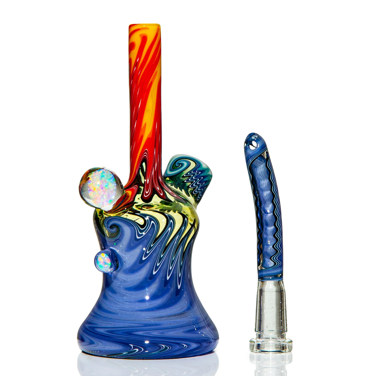 Colorful heady glass water pipe and matching glass accessory with swirling patterns