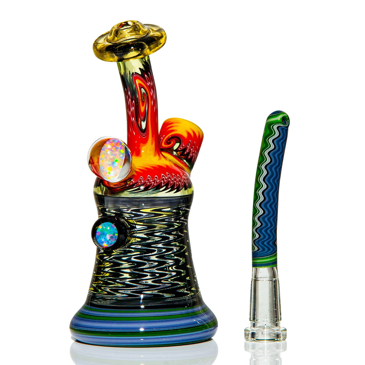 Colorful heady glass water pipe and matching glass wand with intricate patterns