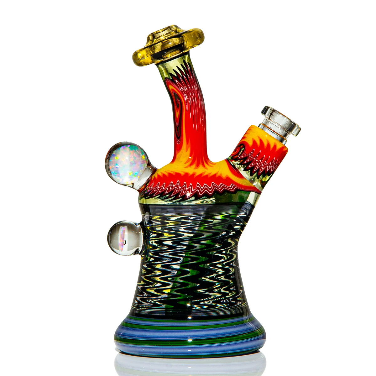 Heady glass water pipe with vibrant red, yellow, and black swirling patterns and opal accents