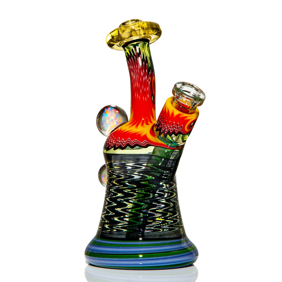 Heady glass water pipe with vibrant red, yellow, and blue swirls on a white background