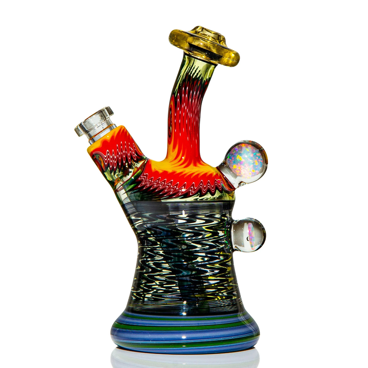 Heady glass water pipe with vibrant red, yellow, and blue patterns and accent marbles