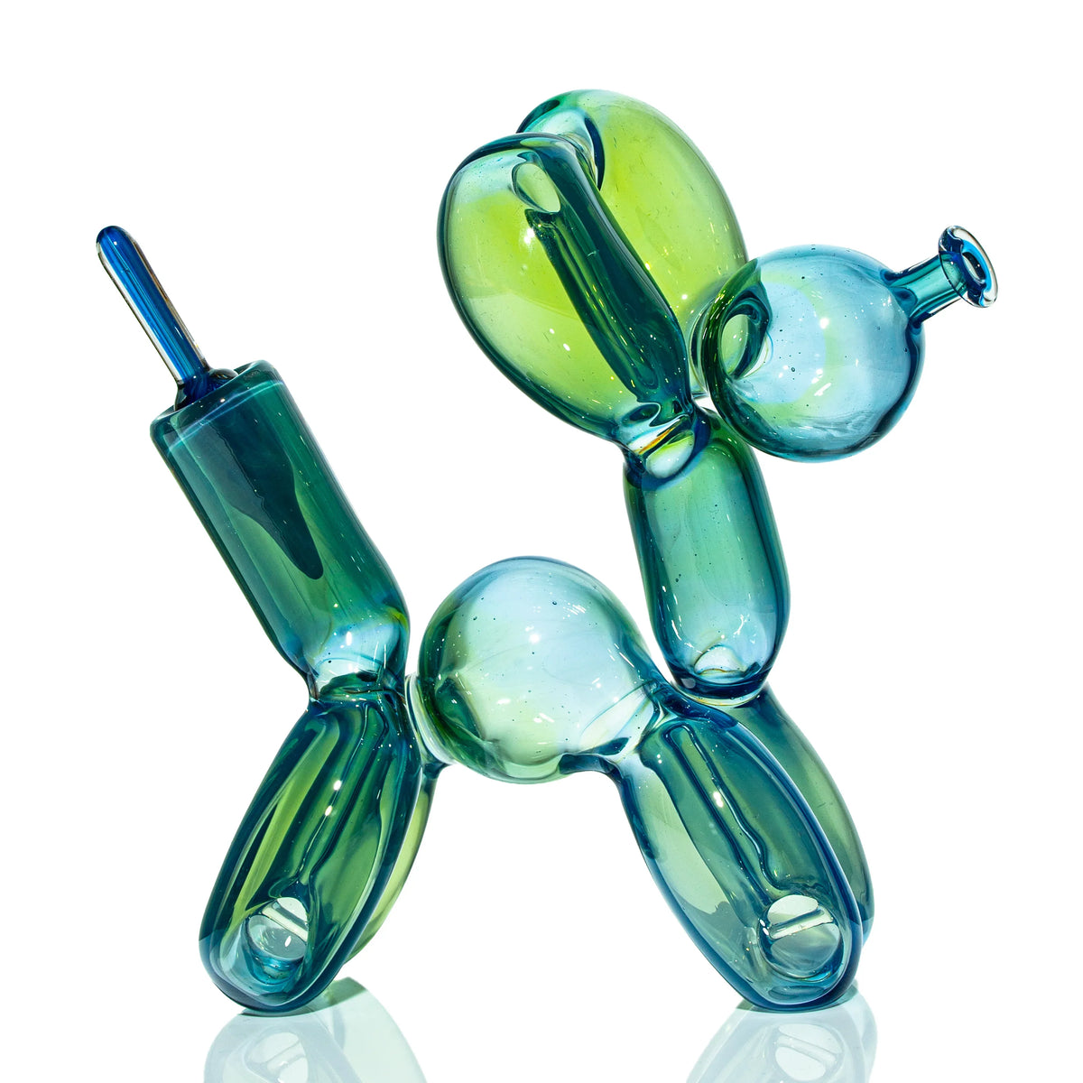 Heady glass pipe shaped like a blue and green balloon dog on white background