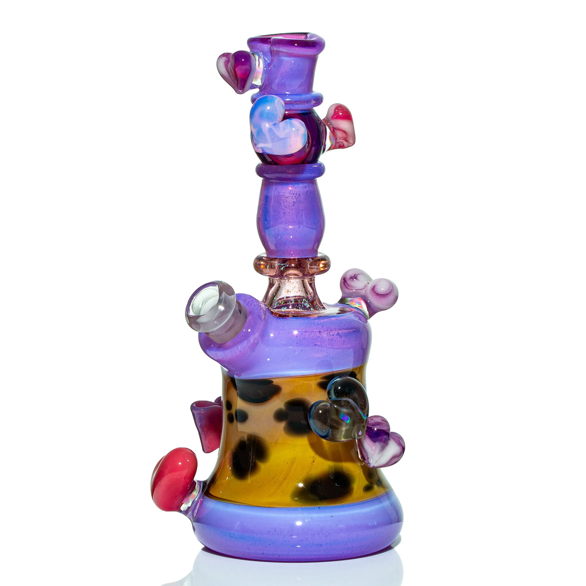 Colorful heady glass water pipe with purple, yellow, and heart-shaped accents
