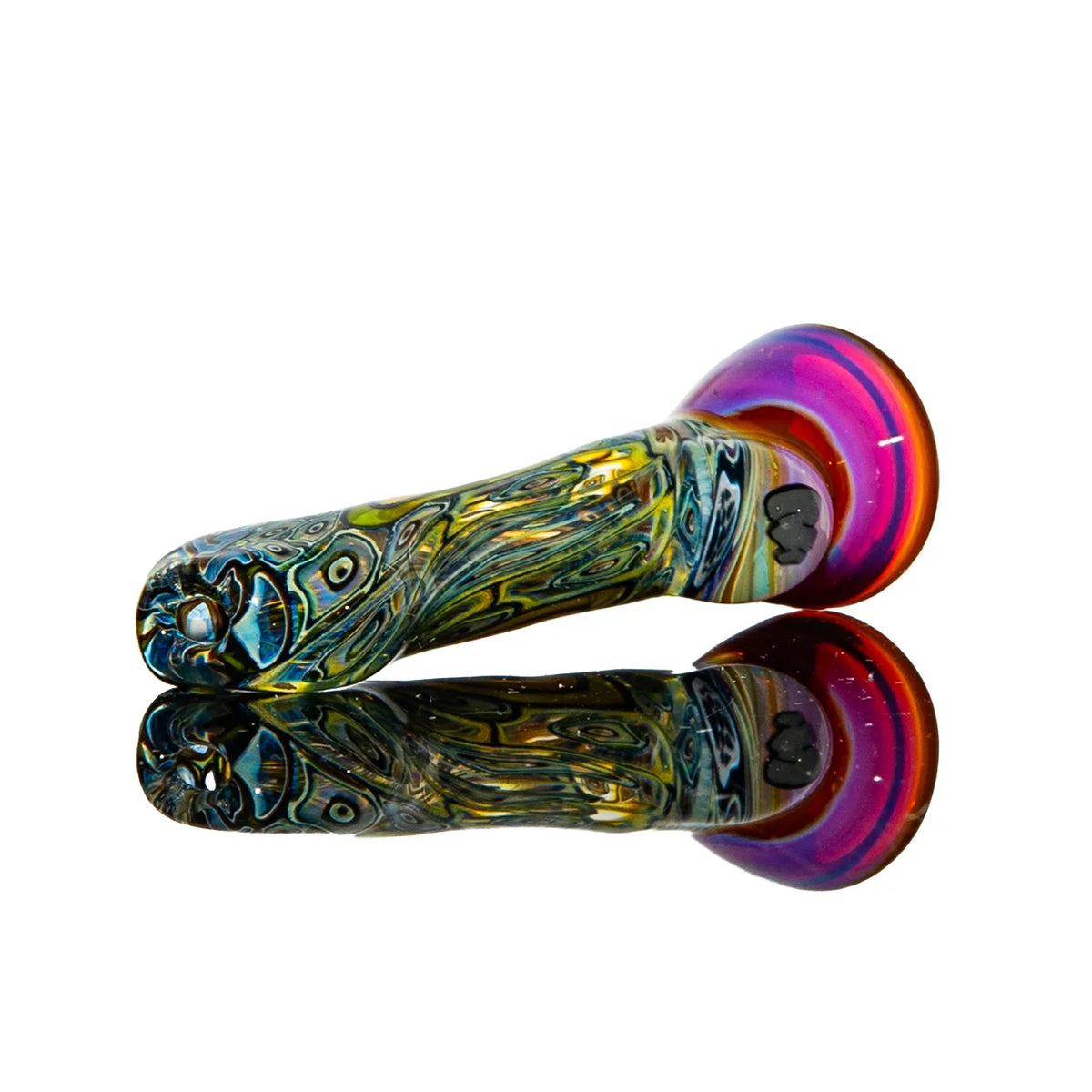Colorful glass hand pipe with intricate patterns and iridescent finish, reflected on white background.