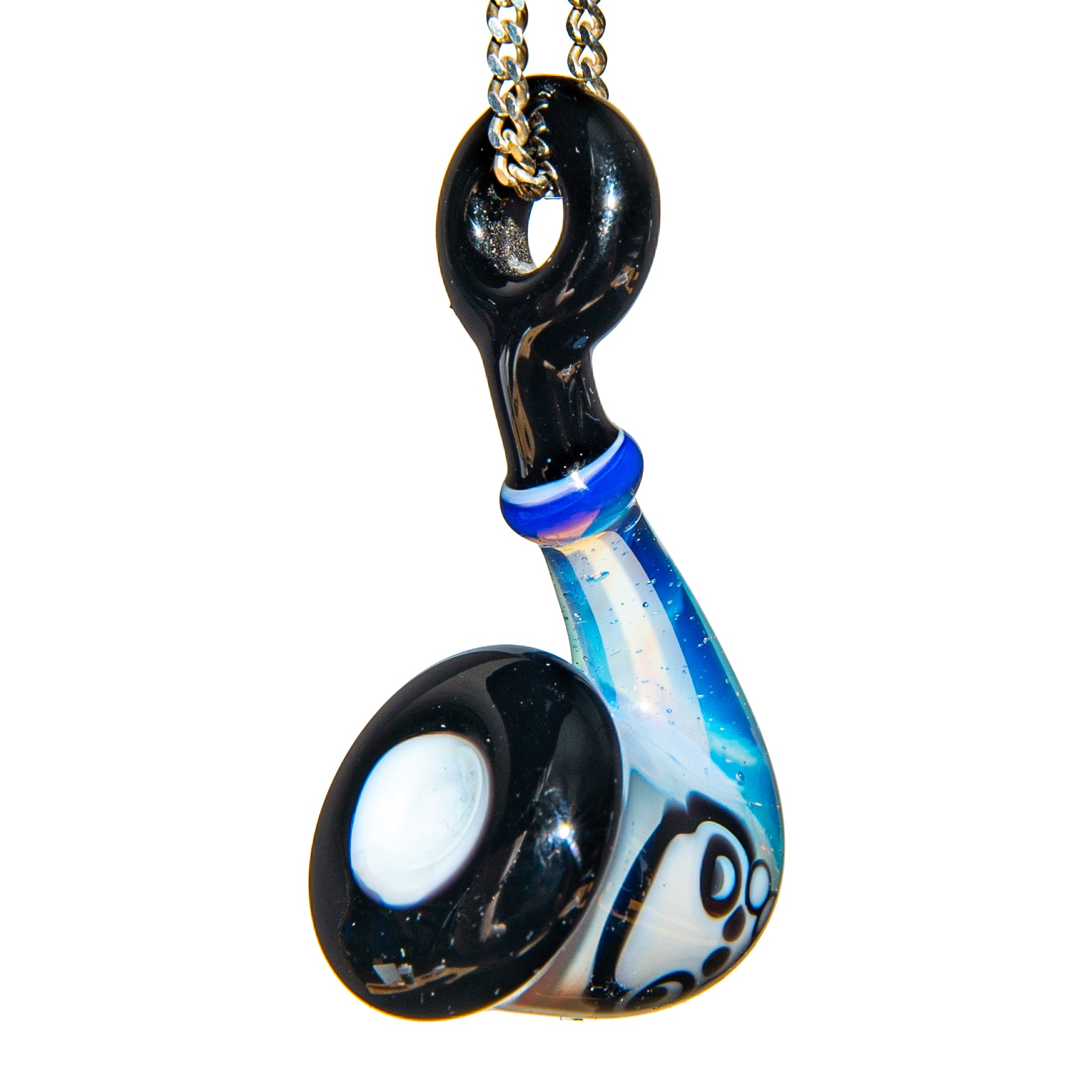 Heady glass pendant with black, blue, and white swirls on a chain necklace