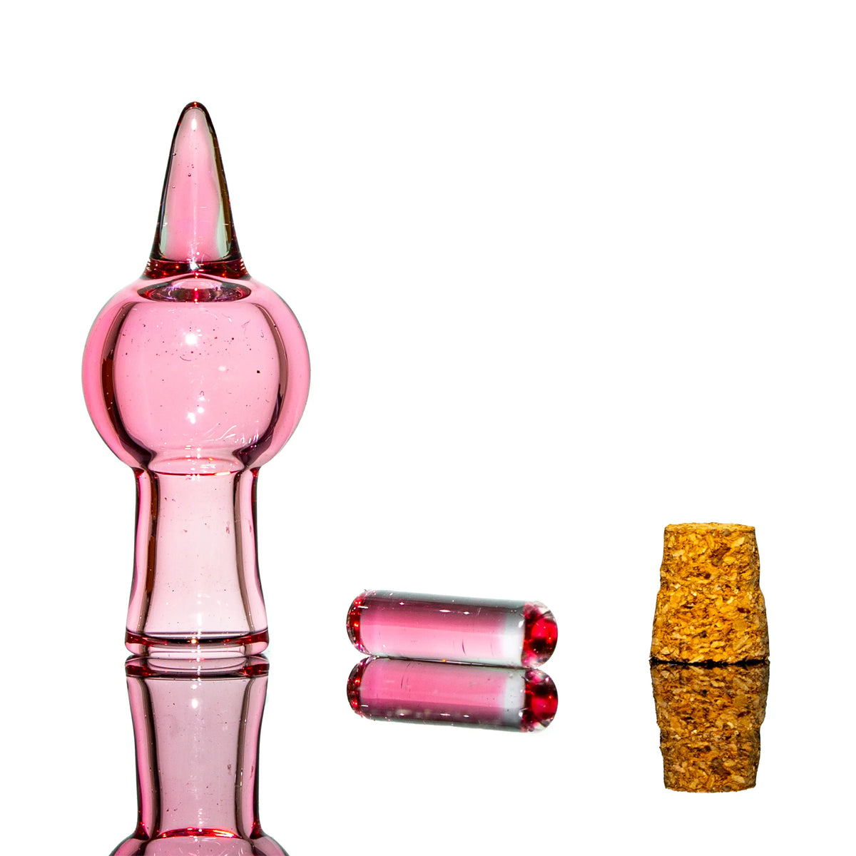 Pink glass dab tool with matching vial and cork on white background