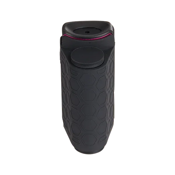 Black hexagon-textured silicone hand pipe with a round lid, shown from above