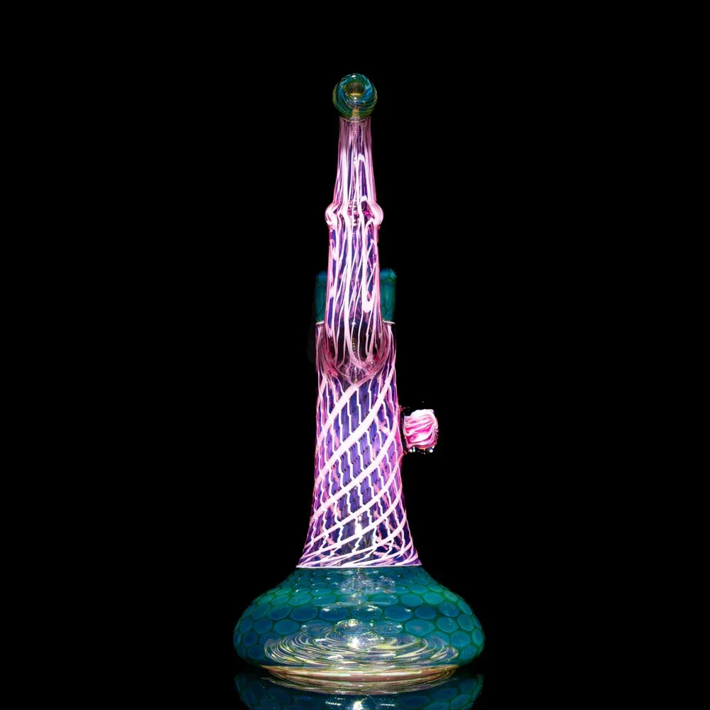 Colorful glass bubbler with swirling pink and blue patterns on black background