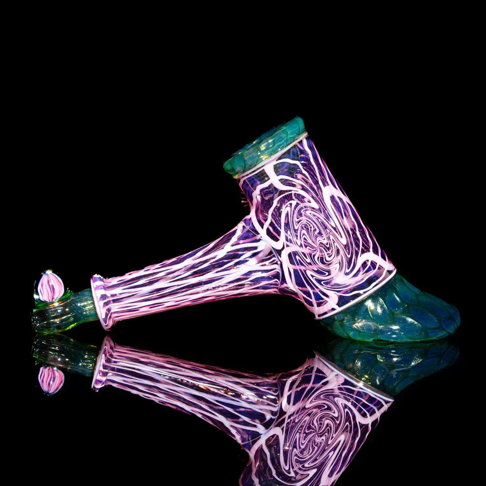 Colorful twisted glass hammer pipe with purple, pink, and teal swirls on black background.