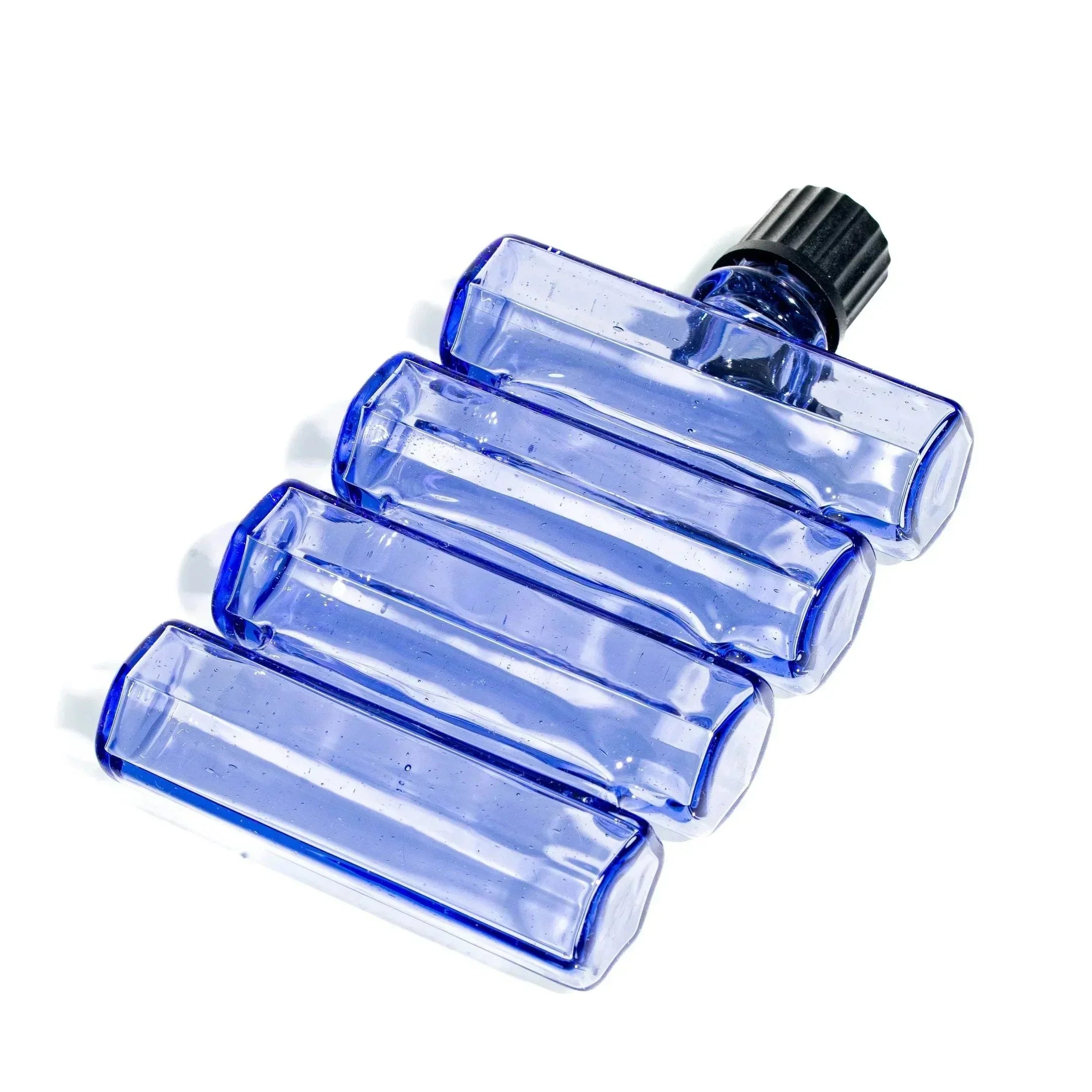 Blue glass smoking pipe with four rectangular chambers and black mouthpiece on white background