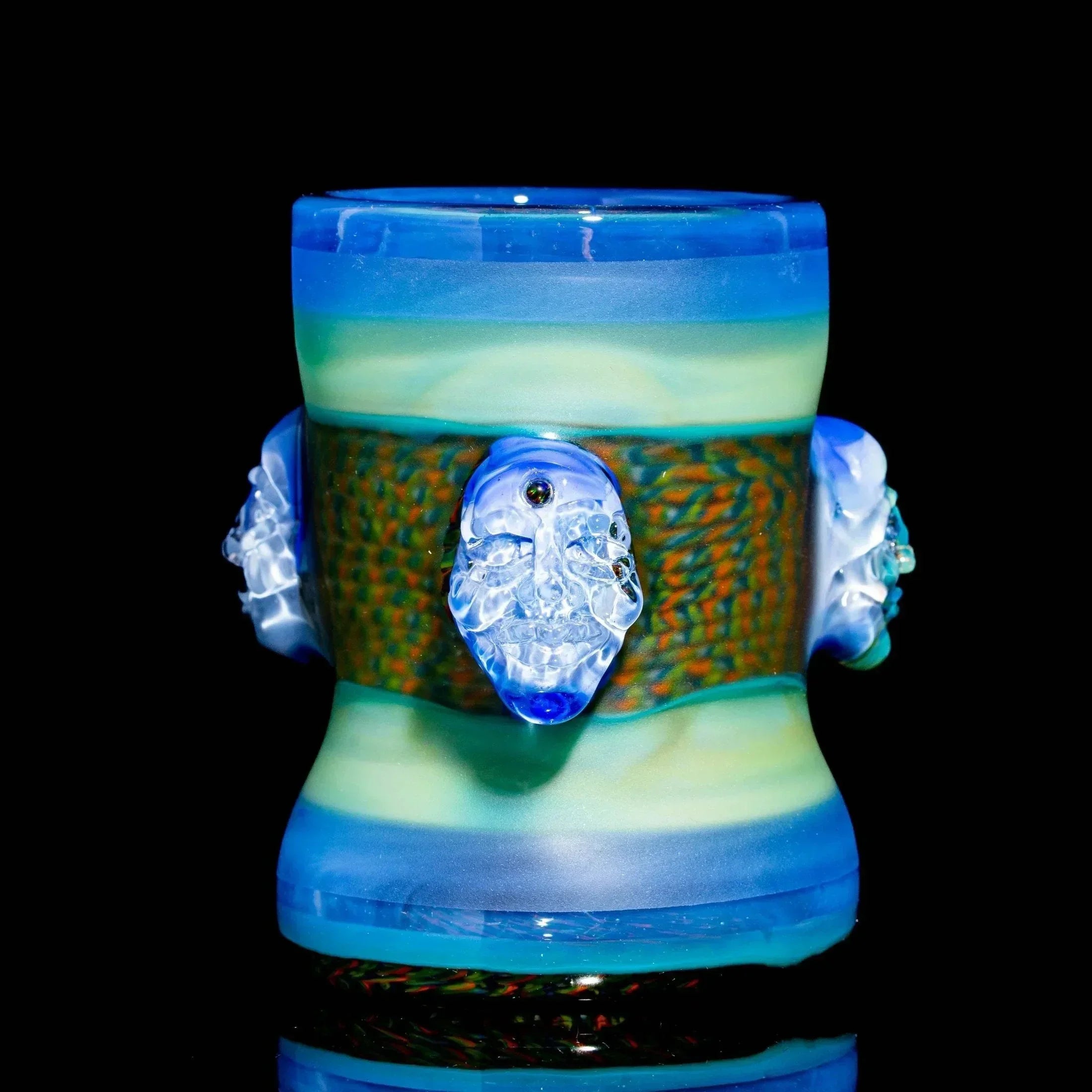Colorful heady glass cup with detailed skull accents and unique layered design