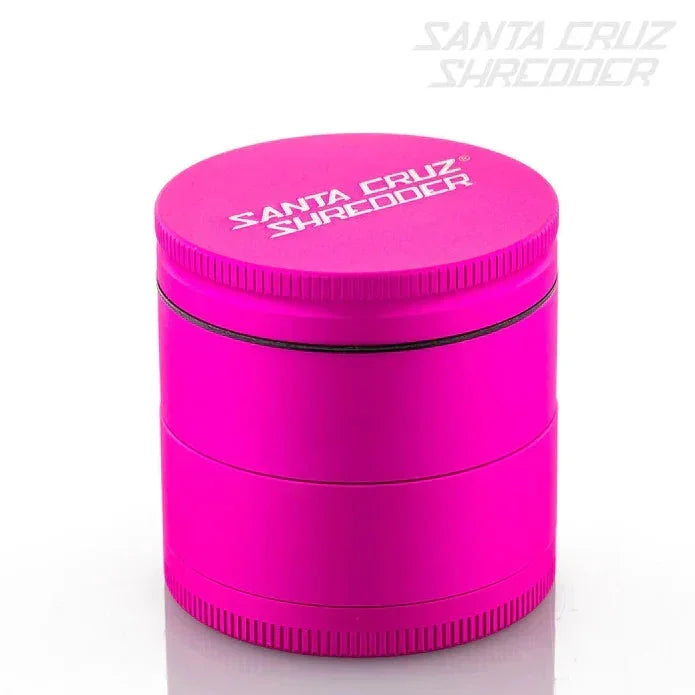Pink Santa Cruz Shredder metal herb grinder with white logo on lid