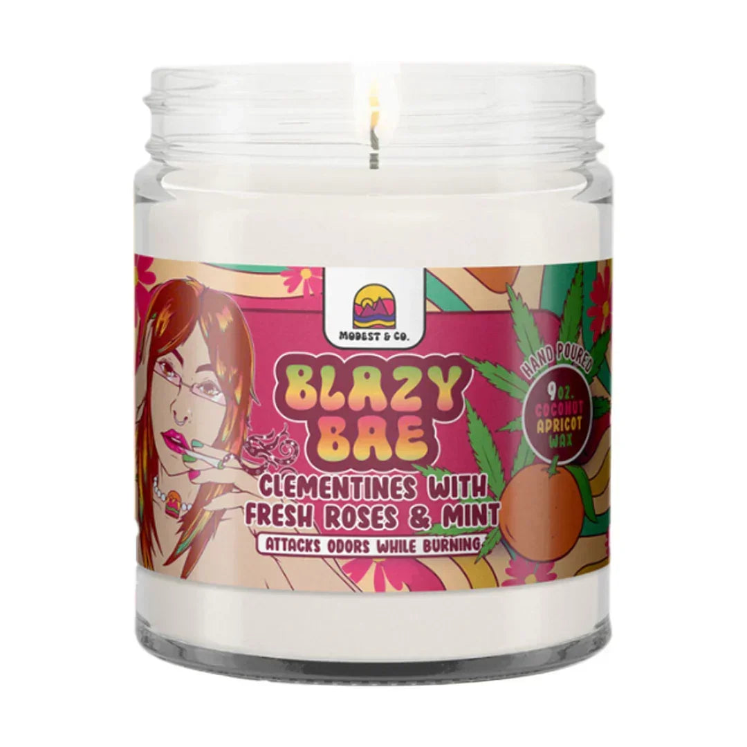 Blazy Bae scented candle in glass jar, labeled clementine, rose, mint, odor eliminating