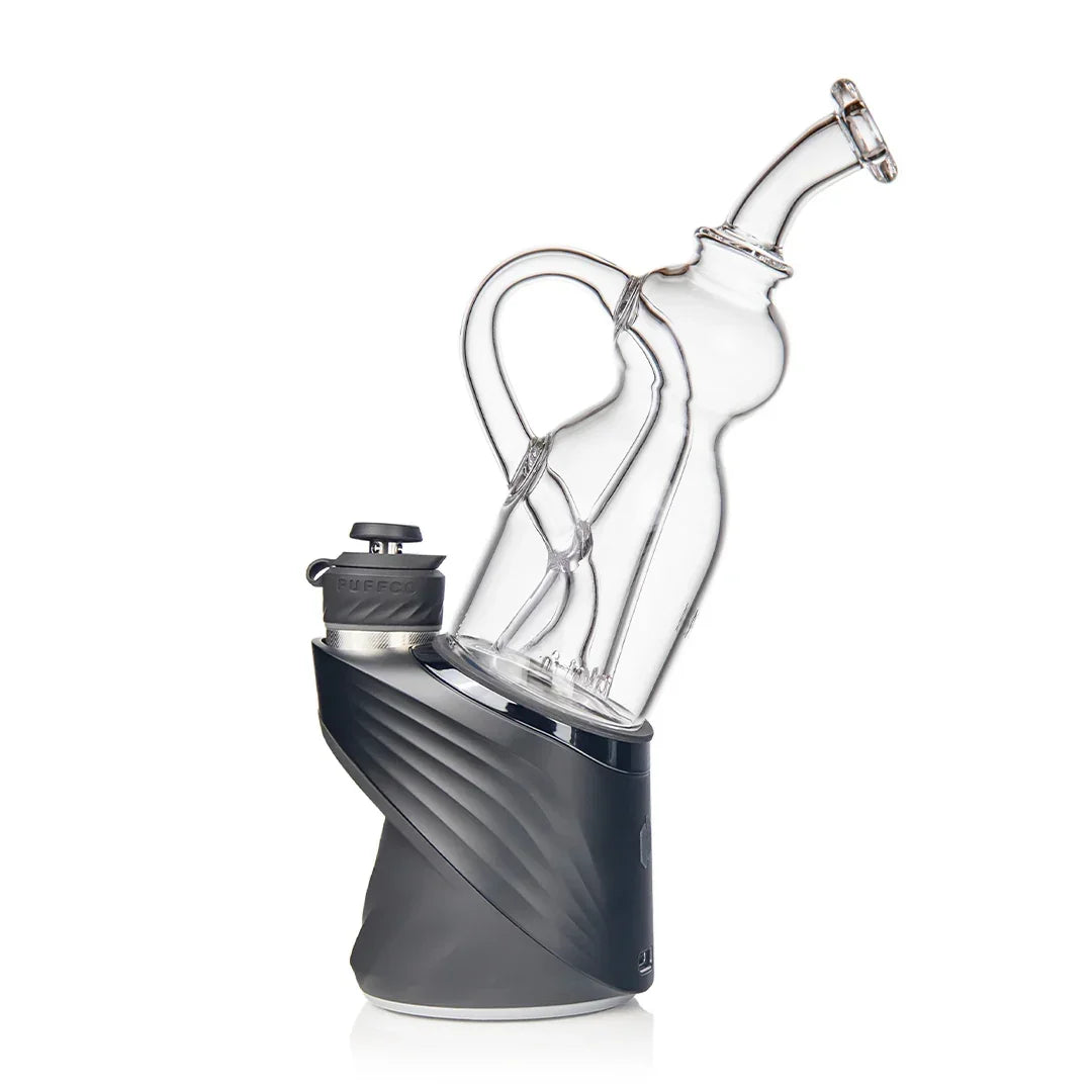 Clear glass vaporizer attachment with ergonomic handle on modern black Puffco base