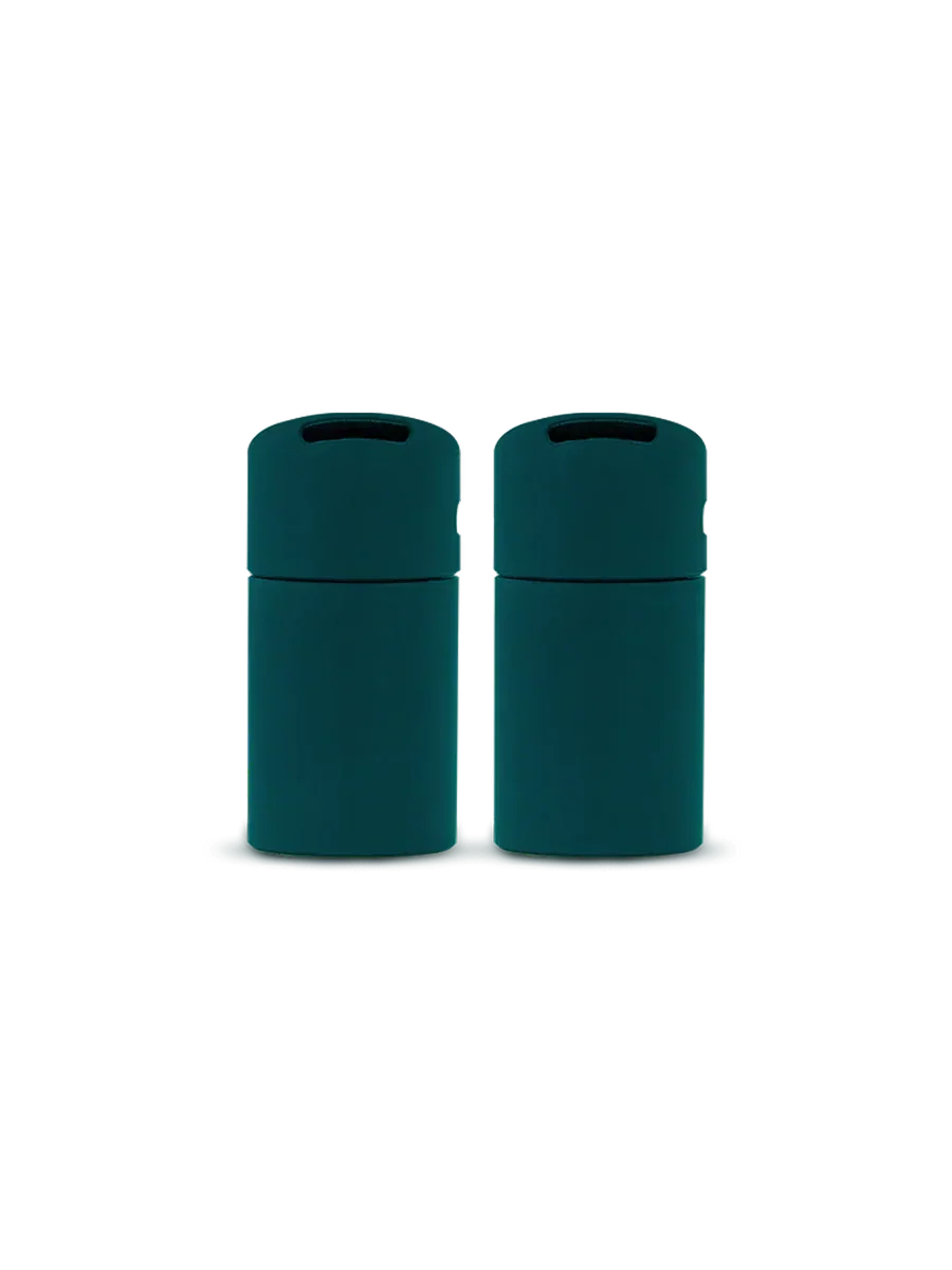 Pair of teal airtight storage containers with pop-top lids on a white background
