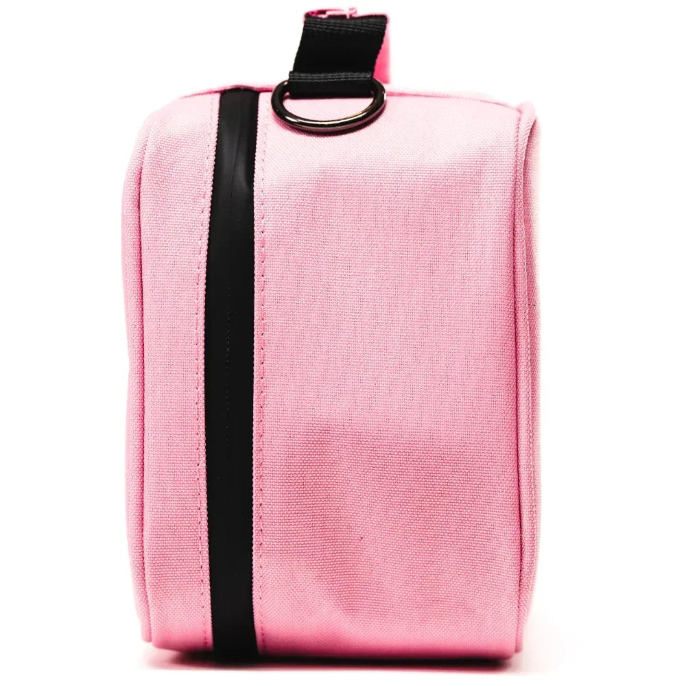 Pink smell-proof travel pouch with black zipper and fabric handle, side view