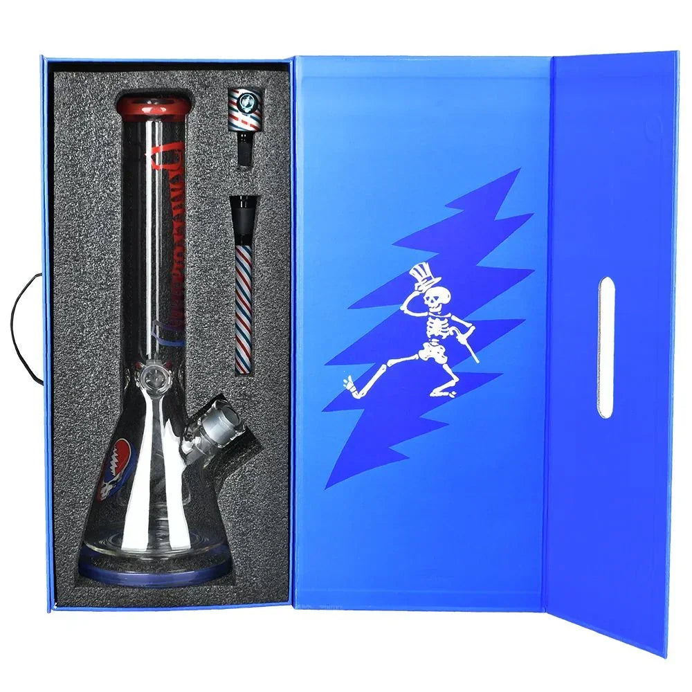 Glass water pipe with Grateful Dead theme in blue box with skeleton design
