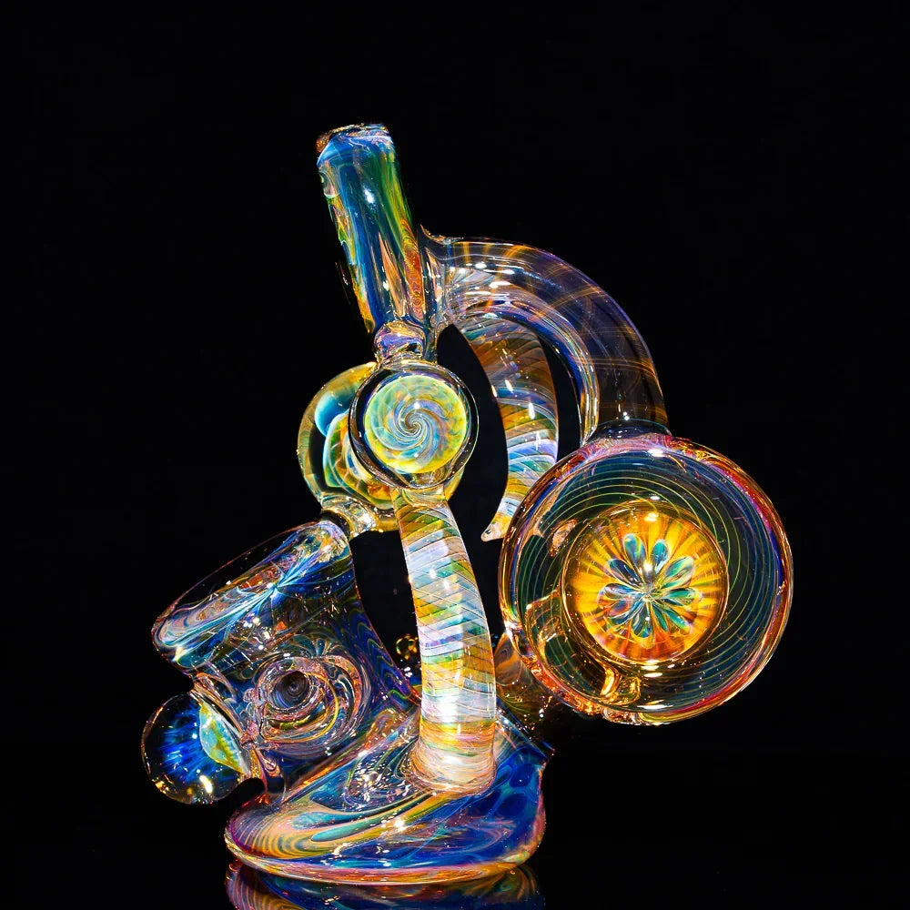 Colorful heady glass water pipe with intricate swirling designs displayed on black background
