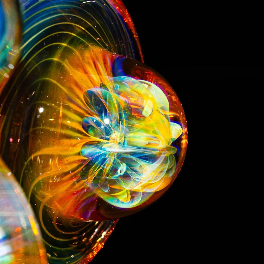 Close-up of colorful heady glass art with intricate fume patterns and vibrant swirls