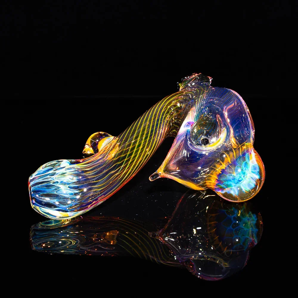 Colorful honeycomb fume glass hand pipe with side lock design on black background