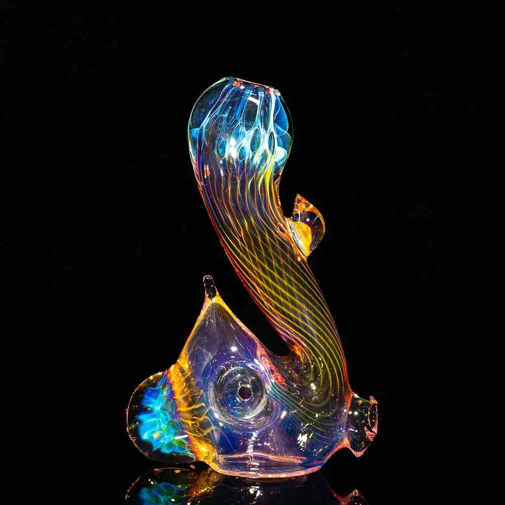 Colorful honeycomb fume glass water pipe with swirling patterns on black background