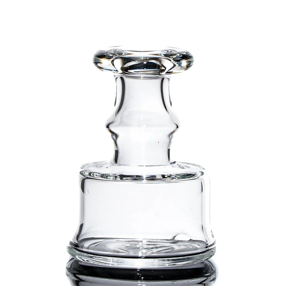 Clear glass vaporizer attachment with a wide base and contoured neck on a white background