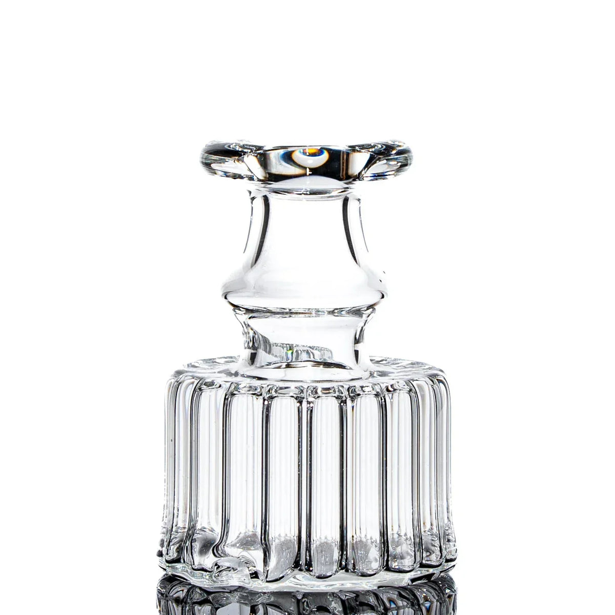 Clear scalloped glass Peak attachment with ribbed base and flared mouthpiece on white background
