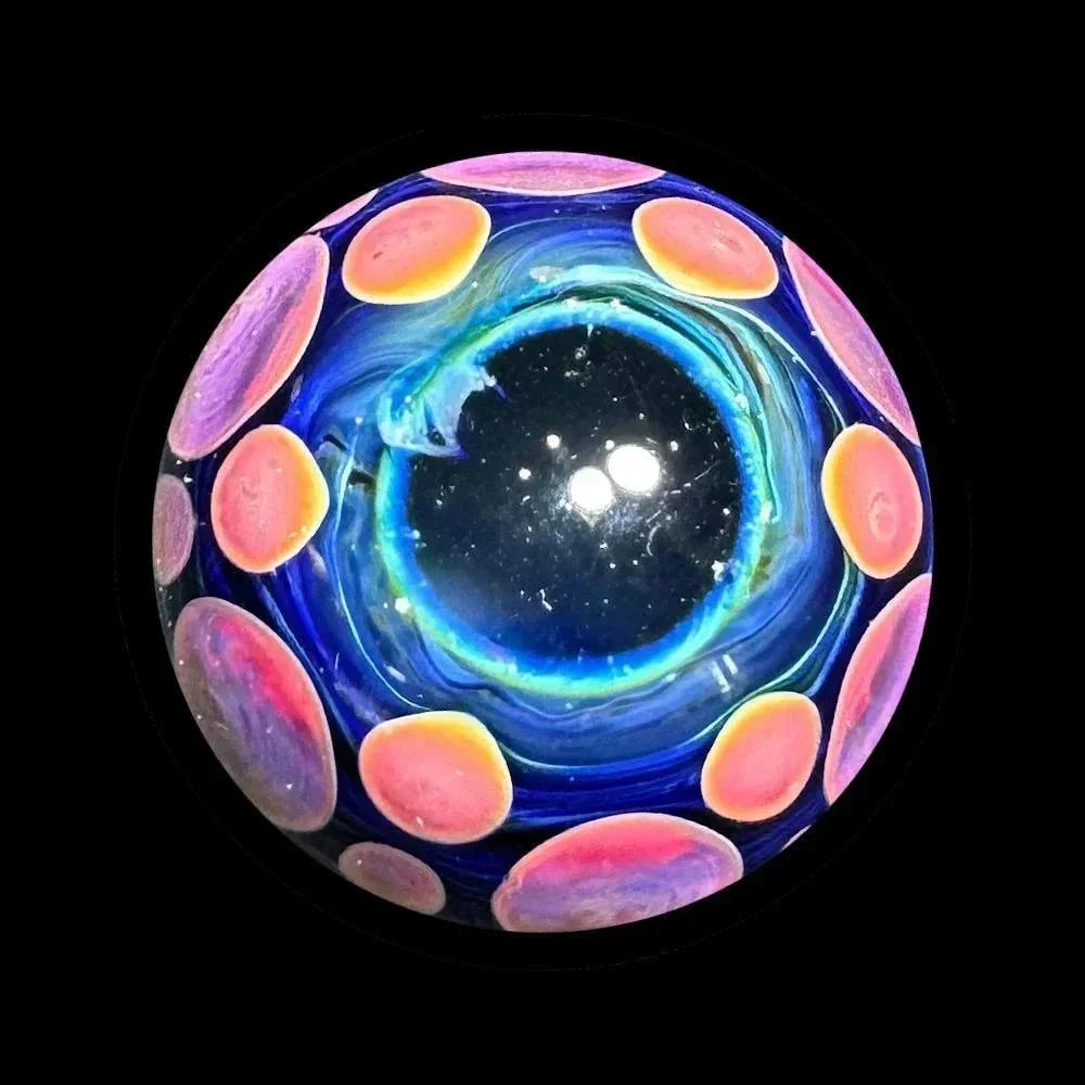 Heady glass marble with vibrant blue, purple, and pink swirl and dotted design