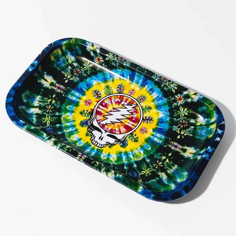 Colorful tie-dye rolling tray with lightning skull graphic, smoking accessories background