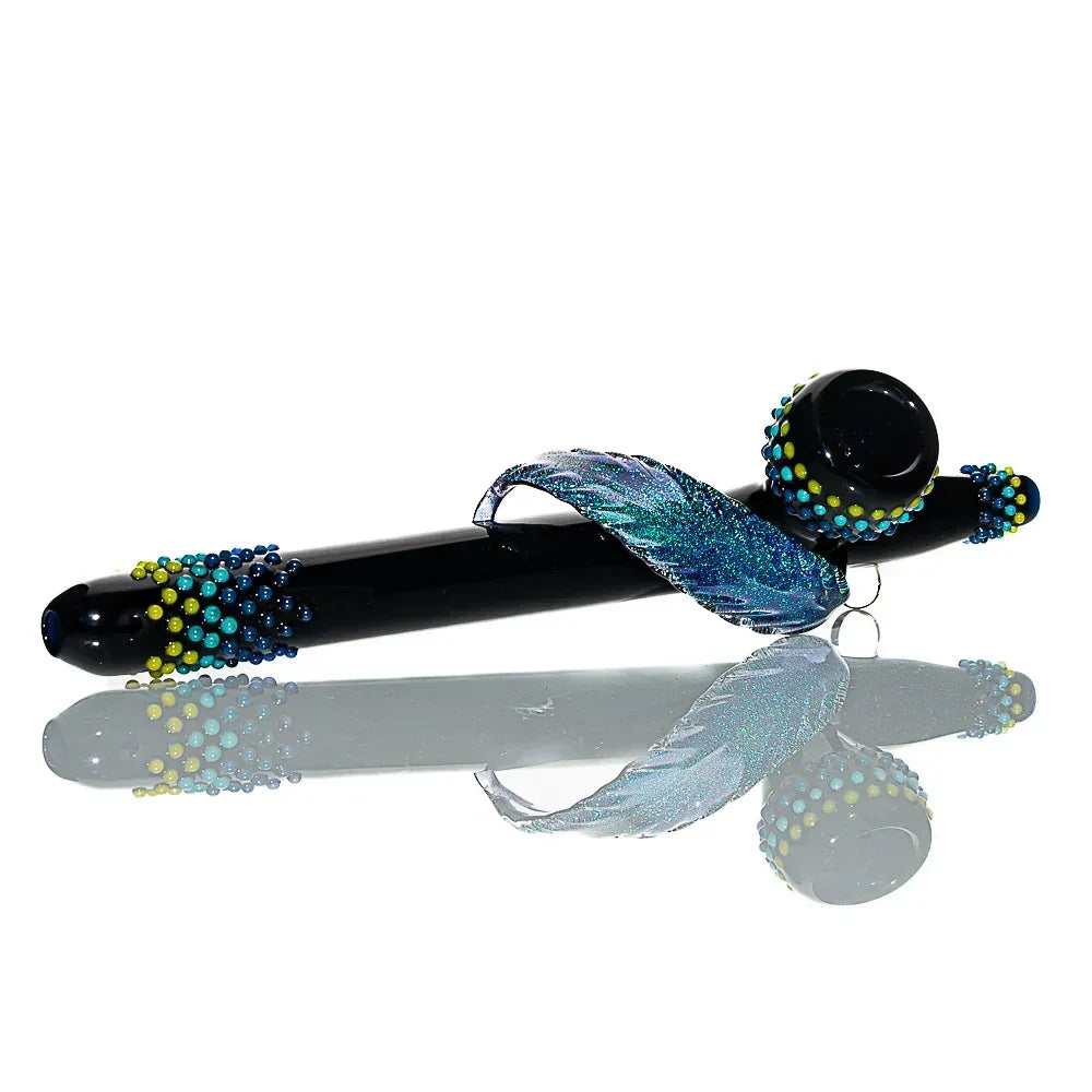 Handcrafted glass ceremonial pipe with blue dichroic feather and colorful dot accents.