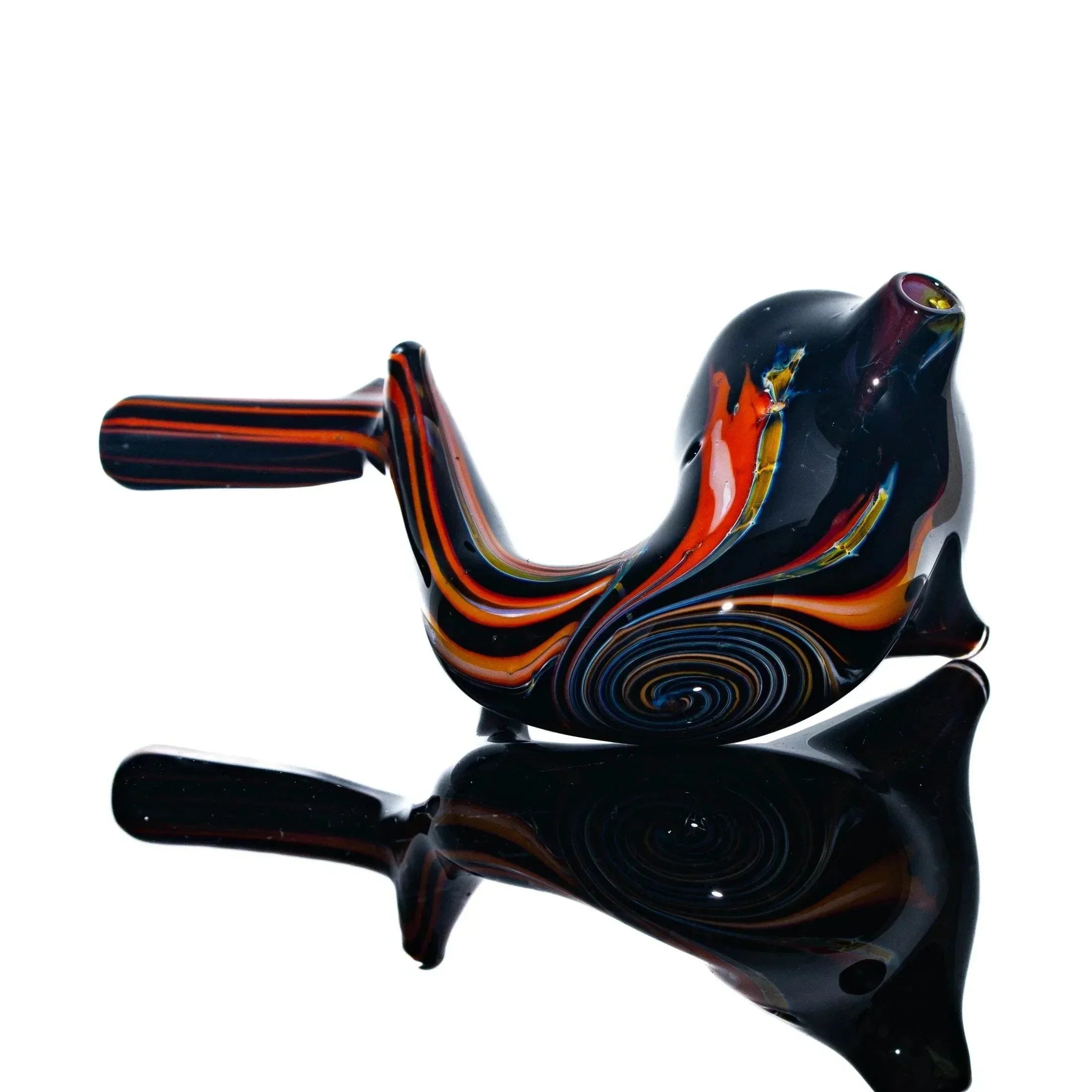 Colorful glass sherlock pipe with black, orange, and red swirls on a reflective surface
