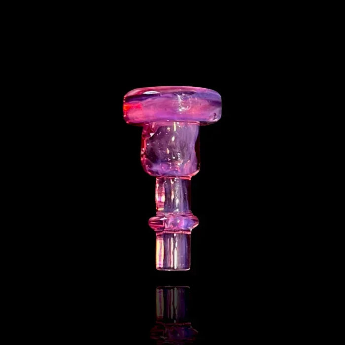 Iridescent pink glass bowl accessory for water pipe on black background