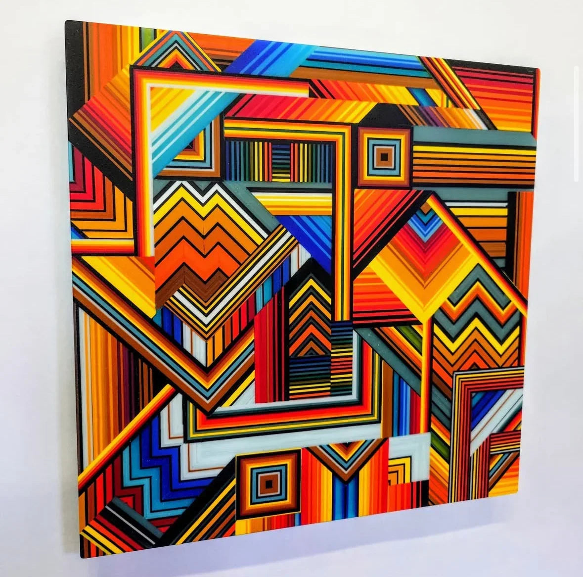 Colorful geometric abstract wall art with bold lines and vibrant striped patterns