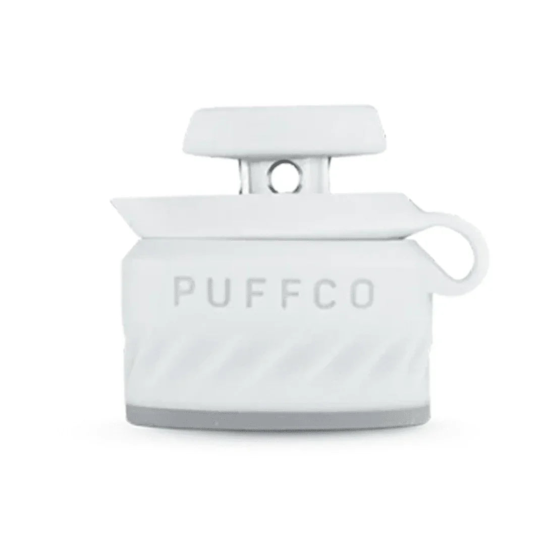 White Puffco silicone travel cap and accessory for vaporizers on white background